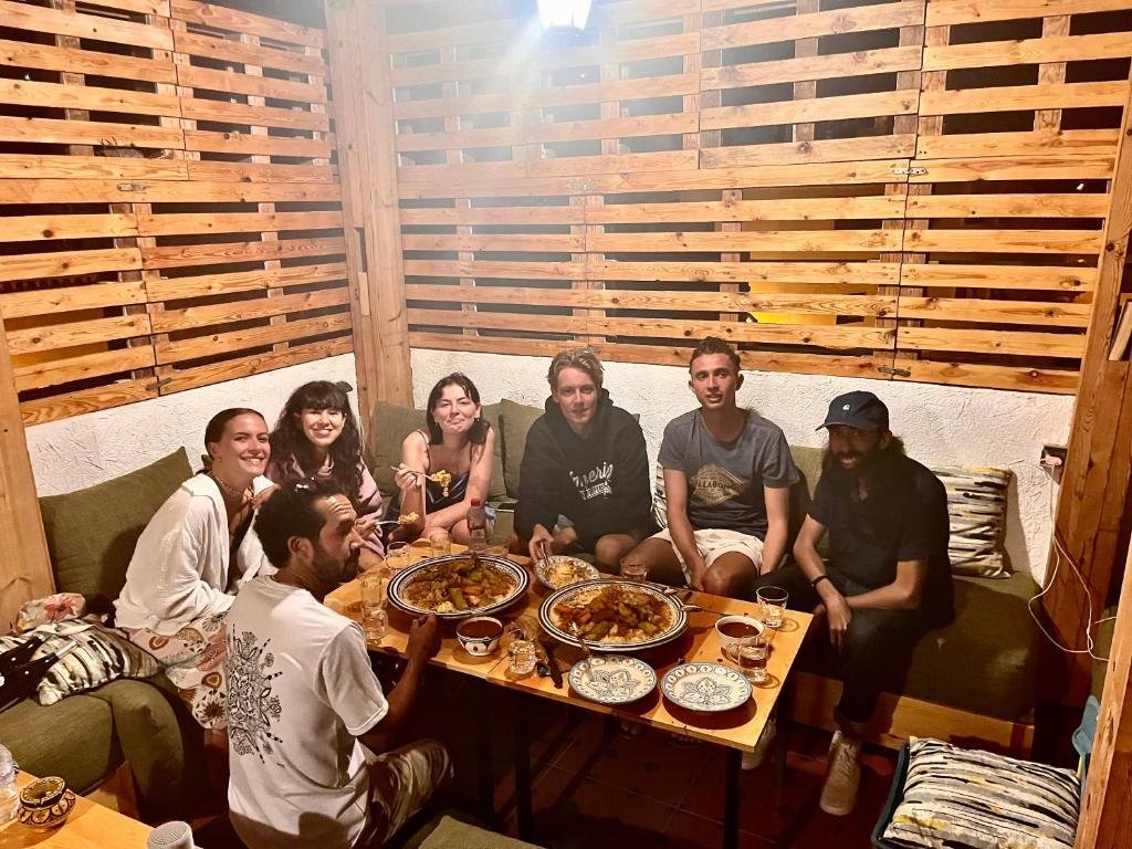 Guests sharing a rooftop dinner on Thursday