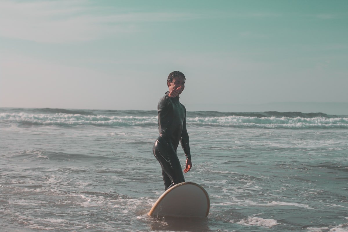 Surfer in the waves off Taghazout